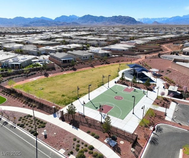 drone / aerial view with a mountain view and a residential view