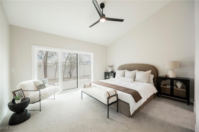 bedroom featuring access to exterior, high vaulted ceiling, carpet floors, and a ceiling fan