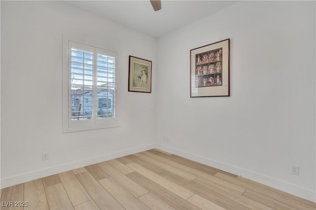 empty room with light wood-style flooring, baseboards, and ceiling fan