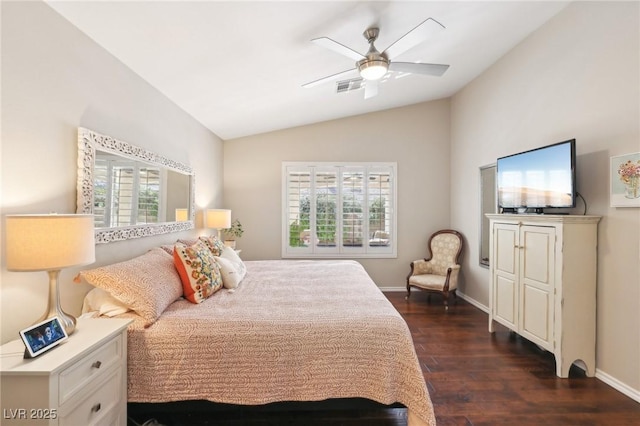 bedroom with baseboards, visible vents, lofted ceiling, dark wood-style floors, and ceiling fan