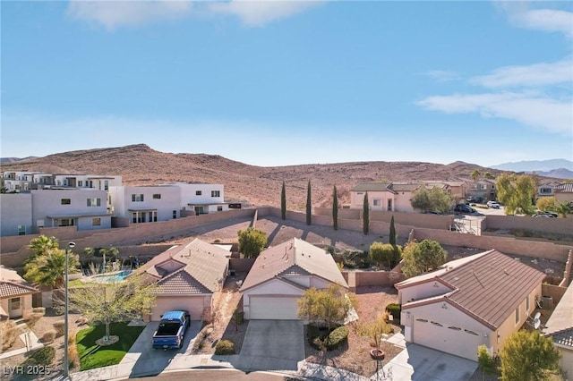 bird's eye view featuring a residential view and a mountain view