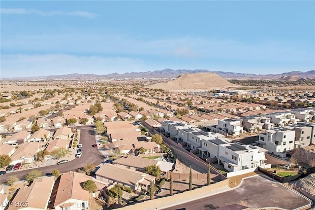 drone / aerial view with a residential view and a mountain view