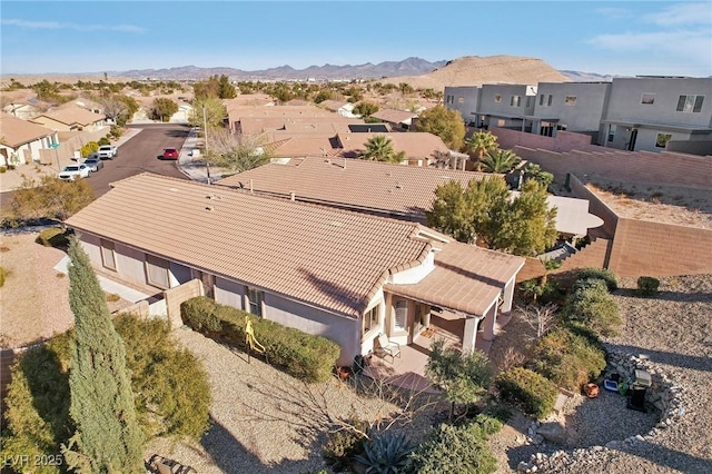 drone / aerial view featuring a mountain view and a residential view