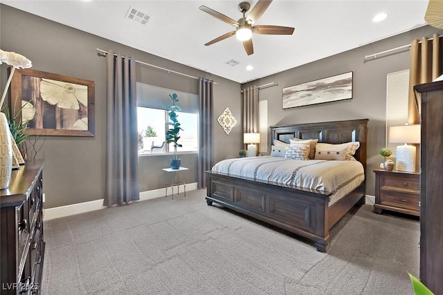 bedroom featuring carpet floors, recessed lighting, visible vents, and baseboards