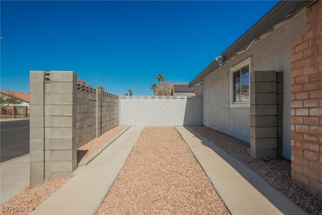 6284 Pinewood Ave, Las Vegas, NV 89103 - view of yard with fence