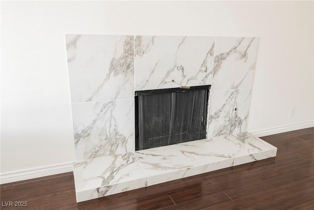 6284 Pinewood Ave, Las Vegas, NV 89103 - interior details with a premium fireplace, wood finished floors, and baseboards