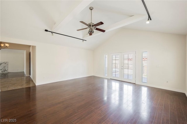 6284 Pinewood Ave, Las Vegas, NV 89103 - unfurnished living room with high vaulted ceiling, wood finished floors, baseboards, beamed ceiling, and rail lighting