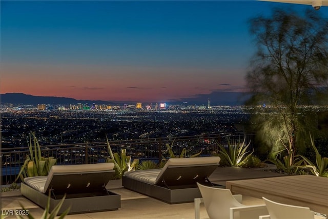 view of patio featuring an outdoor hangout area and a view of city