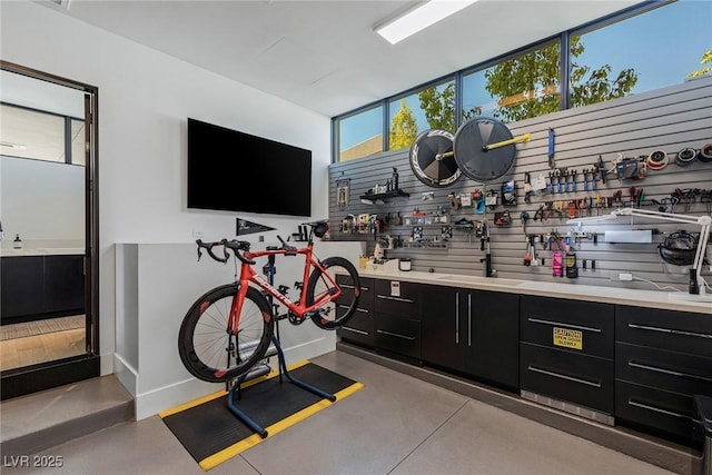 bar featuring concrete flooring