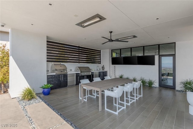 dining space featuring a ceiling fan, floor to ceiling windows, and wood finished floors