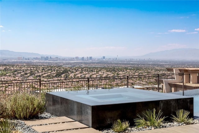 view of mountain feature featuring a view of city