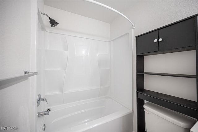 full bath with shower / tub combination and toilet