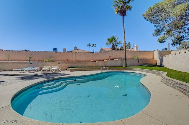 view of pool featuring a patio area, a fenced backyard, and a fenced in pool