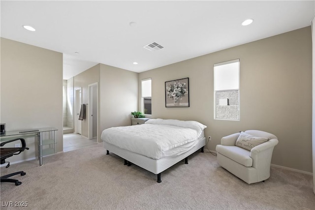 carpeted bedroom with recessed lighting, visible vents, ensuite bath, and baseboards