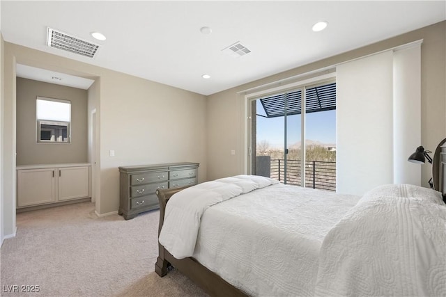 bedroom with access to exterior, light colored carpet, visible vents, and recessed lighting