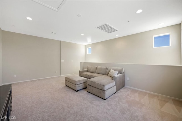 living area with recessed lighting, visible vents, light carpet, and baseboards