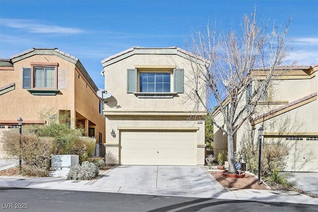 traditional-style home featuring a garage, driveway, and stucco siding