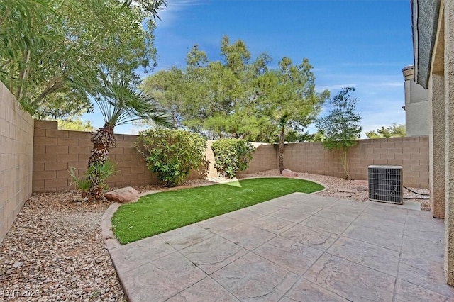 view of patio / terrace with central AC and a fenced backyard