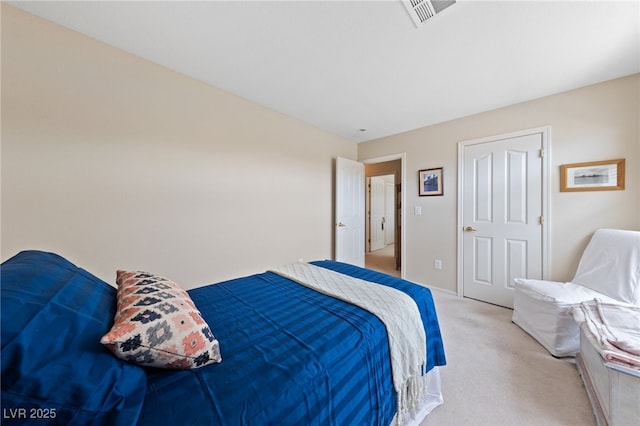 bedroom with light carpet and visible vents