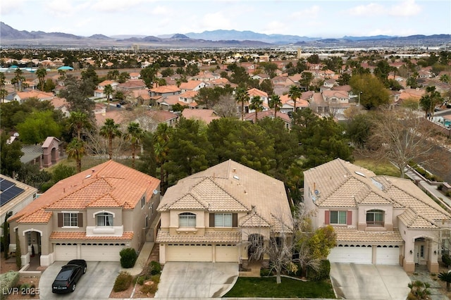 bird's eye view with a mountain view and a residential view