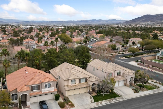 aerial view featuring a residential view and a mountain view