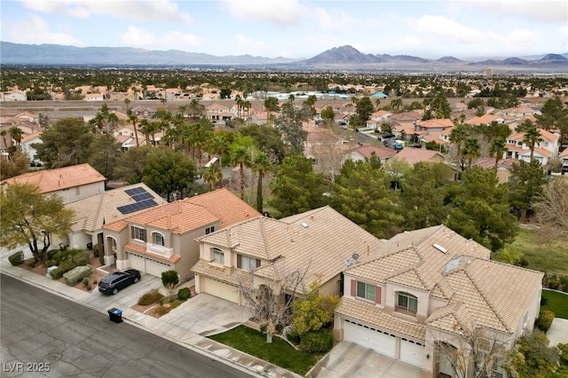 bird's eye view featuring a mountain view and a residential view