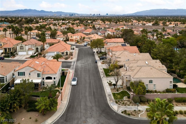 birds eye view of property featuring a residential view and a mountain view