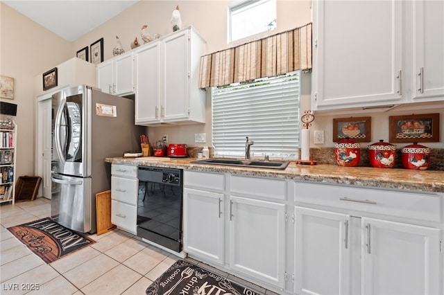 kitchen featuring light tile patterned floors, a sink, white cabinets, black dishwasher, and smart refrigerator