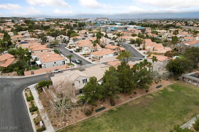 birds eye view of property with a residential view