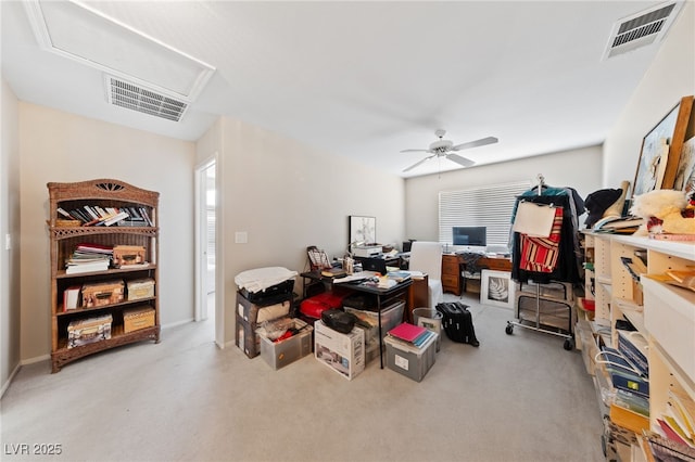 office with carpet floors, visible vents, and a ceiling fan