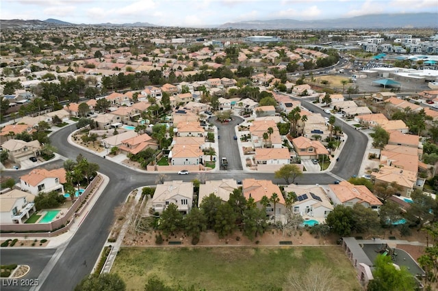 aerial view featuring a mountain view and a residential view