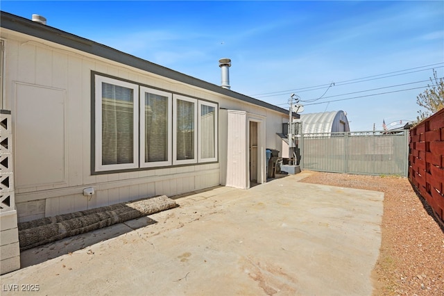 exterior space featuring a patio area and fence