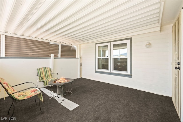 view of patio / terrace featuring a fire pit