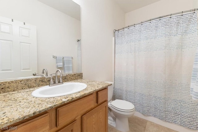 bathroom featuring a shower with shower curtain, vanity, toilet, and tile patterned floors