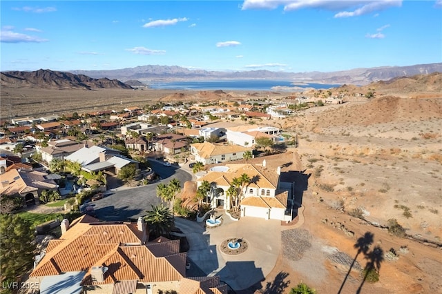 bird's eye view with a residential view and a mountain view