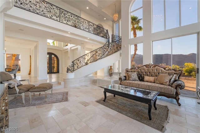 common area with a mountain view and stairway