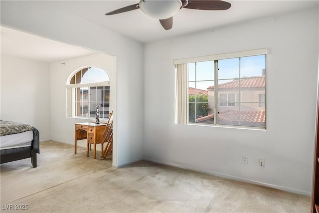 3331 Cheltenham St, Las Vegas, NV 89129 - carpeted bedroom with multiple windows, a ceiling fan, and baseboards