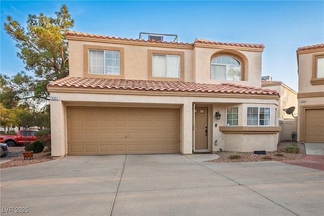 3331 Cheltenham St, Las Vegas, NV 89129 - view of front of house featuring driveway, a garage, and stucco siding