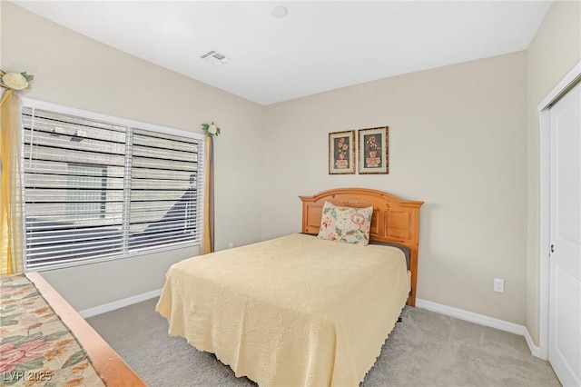 7177 W Camero Ave, Las Vegas, NV 89113 - bedroom with light carpet, visible vents, and baseboards