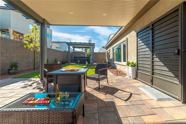 7177 W Camero Ave, Las Vegas, NV 89113 - view of patio with a fire pit and a fenced backyard