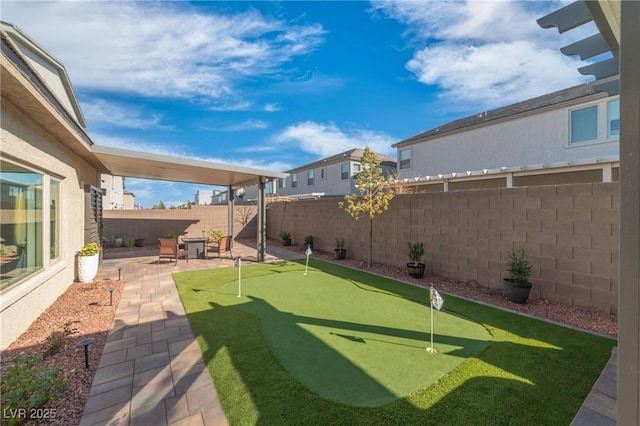 7177 W Camero Ave, Las Vegas, NV 89113 - view of yard with a patio area and a fenced backyard