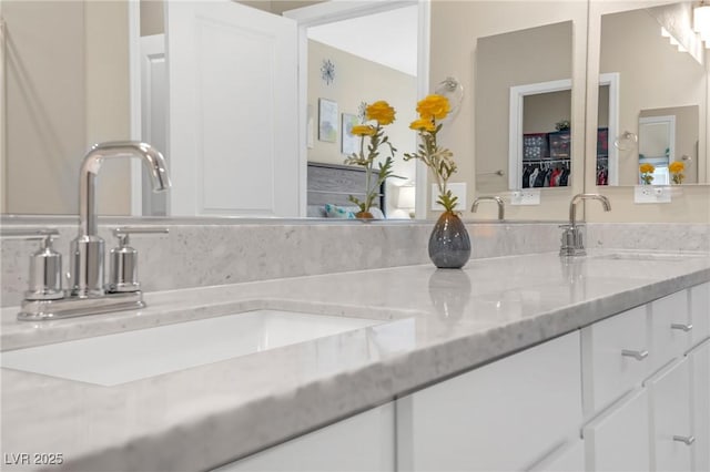 7177 W Camero Ave, Las Vegas, NV 89113 - bathroom featuring double vanity and a sink