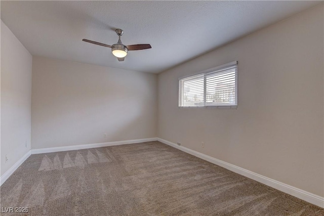 unfurnished room with carpet, ceiling fan, a textured ceiling, and baseboards