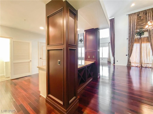 kitchen with dark wood-style floors, baseboards, light countertops, and recessed lighting