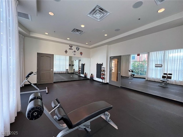 gym featuring visible vents and recessed lighting