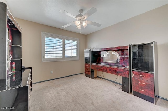 office with ceiling fan, baseboards, and carpet flooring