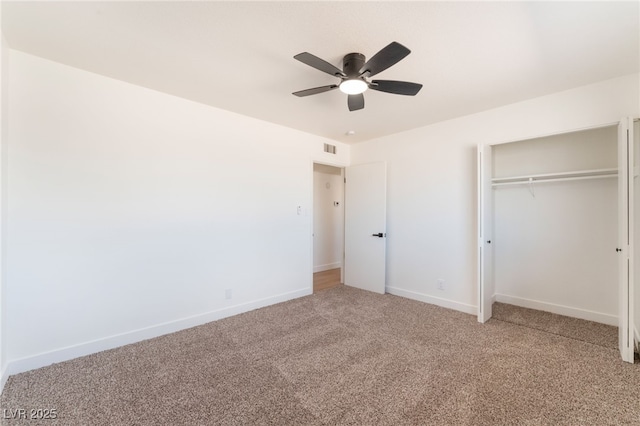 unfurnished bedroom with light carpet, baseboards, visible vents, ceiling fan, and a closet