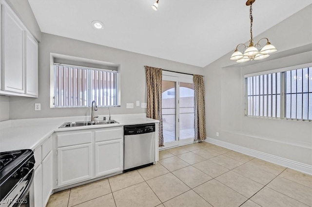 kitchen with stainless steel appliances, hanging light fixtures, white cabinets, vaulted ceiling, and a sink