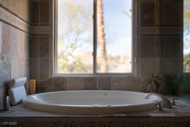 bathroom featuring a bath