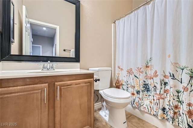 full bathroom with shower / bathtub combination with curtain, vanity, toilet, and tile patterned floors